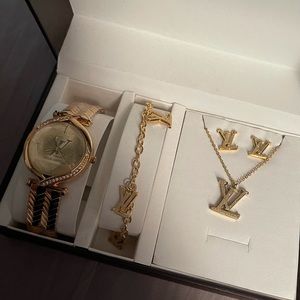 Watch, bracelet, earrings and necklace